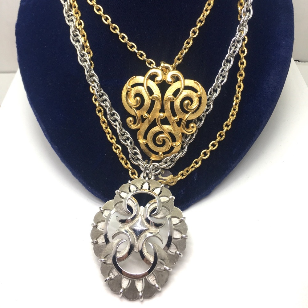 2 of collection Vtg signed Trifari crown lager ornate necklace.